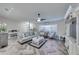 Inviting living room with comfortable seating and an open layout to the dining area at 949 Springview Nw Ave, Port Charlotte, FL 33948