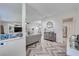 Open-concept living space with stylish decor and seamless flow to other rooms at 949 Springview Nw Ave, Port Charlotte, FL 33948