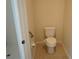 Toilet stall features beige tile flooring at 98 Valdiva St, Punta Gorda, FL 33983