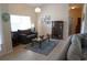 Bright and airy living room with tile flooring, modern furnishings, and lots of natural light at 98 Valdiva St, Punta Gorda, FL 33983