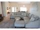 Inviting living space with a large sofa, area rug, and stylish accents at 98 Valdiva St, Punta Gorda, FL 33983