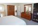 Spacious main bedroom featuring natural light, carpeted floor, and a relaxing reading nook at 98 Valdiva St, Punta Gorda, FL 33983