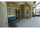 Covered patio with comfortable seating and sliding glass doors for indoor/outdoor living at 98 Valdiva St, Punta Gorda, FL 33983