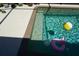 Clear, refreshing pool water with pool toys and convenient entry steps at 98 Valdiva St, Punta Gorda, FL 33983