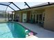 Inviting screened-in pool area with an open patio and comfortable seating, perfect for relaxation at 98 Valdiva St, Punta Gorda, FL 33983