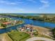 Magnificent waterfront estate with stunning views, private dock, and manicured landscaping at 10580 Poughkeepsie Cir, Port Charlotte, FL 33981