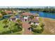 Beautiful waterfront home on a manicured lot, boasting a private dock, multi-car garage, and lovely views at 10580 Poughkeepsie Cir, Port Charlotte, FL 33981