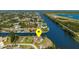 Waterfront property with expansive views, lush landscaping, and a convenient location at 10580 Poughkeepsie Cir, Port Charlotte, FL 33981