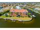 Orange waterfront condos with private boat slips surrounded by manicured lawns at 1326 Wesley Dr # 132, Punta Gorda, FL 33950