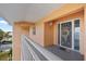 Condo porch area with views of water and other condos at 1326 Wesley Dr # 132, Punta Gorda, FL 33950