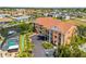 Exterior view of waterfront complex with lush landscaping and ample parking at 1326 Wesley Dr # 132, Punta Gorda, FL 33950