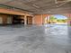 Secure covered parking garage with marked spaces for residents and storage at 1326 Wesley Dr # 132, Punta Gorda, FL 33950