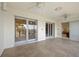 Screened patio offers outdoor living space with tile flooring, fans and water views at 1326 Wesley Dr # 132, Punta Gorda, FL 33950