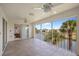 Screened patio offers outdoor living space with waterfront views and ceiling fans at 1326 Wesley Dr # 132, Punta Gorda, FL 33950