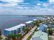 Waterfront complex: aerial view showcases complex along the coast at 1750 Jamaica Way # 312, Punta Gorda, FL 33950