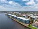 Breathtaking aerial view of blue buildings along the water at 1750 Jamaica Way # 312, Punta Gorda, FL 33950