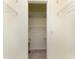 Empty walk-in closet featuring carpet flooring, neutral walls, and wire shelving at 1750 Jamaica Way # 312, Punta Gorda, FL 33950