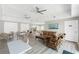 Bright common room with comfortable seating, tables, and a calming ambiance at 1750 Jamaica Way # 312, Punta Gorda, FL 33950