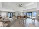 Large, bright common room with water views and tables and seating at 1750 Jamaica Way # 312, Punta Gorda, FL 33950