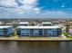 Waterfront three-story condo with ample parking beneath and direct access to waterfront views at 1750 Jamaica Way # 312, Punta Gorda, FL 33950