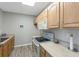 Efficient kitchen layout with essential appliances and plenty of counter space at 1750 Jamaica Way # 312, Punta Gorda, FL 33950