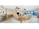Inviting living room featuring comfortable seating, ceiling fans and picturesque water views at 1750 Jamaica Way # 312, Punta Gorda, FL 33950