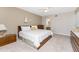 Bedroom boasts ample closet space, neutral decor, and comfortable furnishings, a peaceful retreat at 1750 Jamaica Way # 312, Punta Gorda, FL 33950