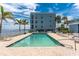 Community pool with waterfront views offers residents a refreshing outdoor retreat at 1750 Jamaica Way # 312, Punta Gorda, FL 33950