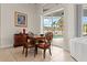 Dining area with sliding doors leading to a screened pool at 18652 Ohara Dr, Port Charlotte, FL 33948