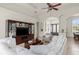 Spacious living room featuring tiled floors, modern furniture, and direct access to entryway at 18652 Ohara Dr, Port Charlotte, FL 33948