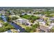 Aerial view showcases waterfront homes with private docks and serene canal settings at 18753 Klingler Cir, Port Charlotte, FL 33948
