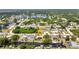 Beautiful aerial view of canal front homes in a lush, waterfront community with access to pristine lakes at 18753 Klingler Cir, Port Charlotte, FL 33948
