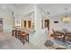 Open-concept dining area with breakfast bar is perfect for casual dining at 18753 Klingler Cir, Port Charlotte, FL 33948