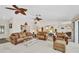 Spacious living room with comfortable couches and open concept at 18753 Klingler Cir, Port Charlotte, FL 33948