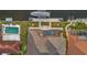 An aerial view of the pool and back of the home, with waterway access at 19 Sabal Dr, Punta Gorda, FL 33950