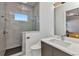 The bathroom has modern features including a glass shower, sleek hardware, and a marble countertop at 19 Sabal Dr, Punta Gorda, FL 33950