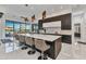 Modern kitchen with a large center island, sleek countertops, and high-end appliances, perfect for entertaining at 19 Sabal Dr, Punta Gorda, FL 33950