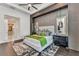 Spacious primary bedroom suite with recessed lighting, an accent wall, and hardwood floors at 19 Sabal Dr, Punta Gorda, FL 33950