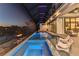 Luxury pool area with spa and a fire feature near the canal at 19 Sabal Dr, Punta Gorda, FL 33950
