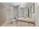The bathroom features a single sink, medicine cabinet, and tiled shower at 19505 Quesada Ave # A204, Port Charlotte, FL 33948