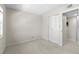 This carpeted bedroom features double door closet at 19505 Quesada Ave # A204, Port Charlotte, FL 33948
