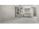 This carpeted bedroom has access to laundry, kitchen and bathroom at 19505 Quesada Ave # A204, Port Charlotte, FL 33948