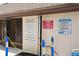 Pool house showcasing the shower area with posted rules and regulations for community residents at 19505 Quesada Ave # A204, Port Charlotte, FL 33948