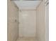 This tiled shower features tiled walls and floor, and a showerhead at 19505 Quesada Ave # A204, Port Charlotte, FL 33948