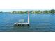 Aerial view of a private boat dock providing easy access to the open water from this waterfront home at 2107 4Th Street W Ct, Palmetto, FL 34221