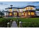 A luxury two-story home with a gorgeous backyard pool, large patio, and a private pier at 2107 4Th Street W Ct, Palmetto, FL 34221