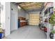 Garage with built-in cabinets, workbench and epoxy floors offers ample storage and work space at 2107 4Th Street W Ct, Palmetto, FL 34221