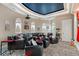Impressive home theater with tiered seating, projector, and unique star-lit ceiling at 2107 4Th Street W Ct, Palmetto, FL 34221