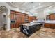 Large kitchen with custom cabinets, granite countertops, and stainless steel appliances at 2107 4Th Street W Ct, Palmetto, FL 34221