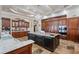 Gourmet kitchen with custom cabinets, granite countertops, and stainless steel appliances at 2107 4Th Street W Ct, Palmetto, FL 34221